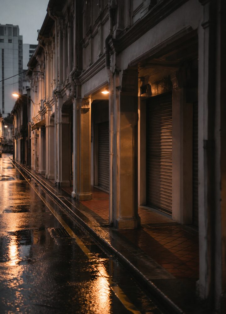 Singapore shophouse street after rain